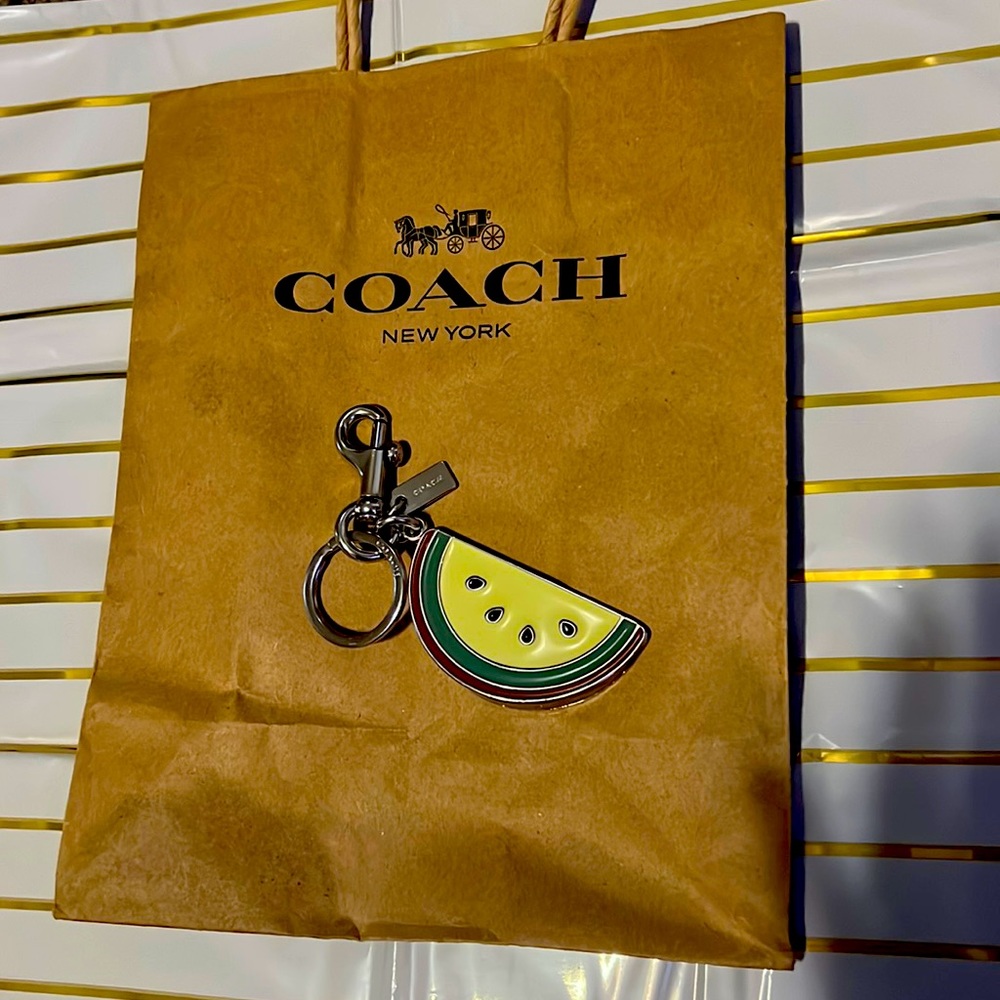 COACH! Bag charm, matches with Any bag, clutch,really anything you can think off